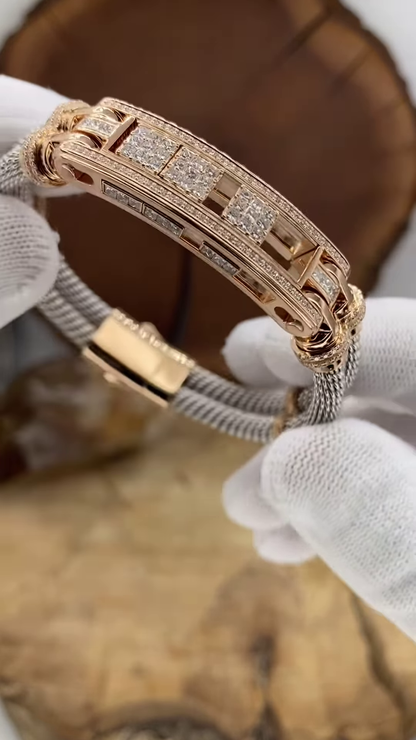 Sophisticated Two-Tone Cable Bracelet with Rose Gold-Toned Accents and Pavé Detailing