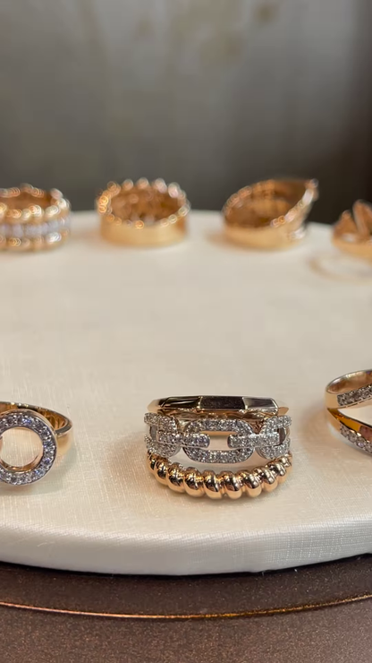 Chic Gold-Toned Ring Stack with Pavé, Textured, and Chain Link Designs